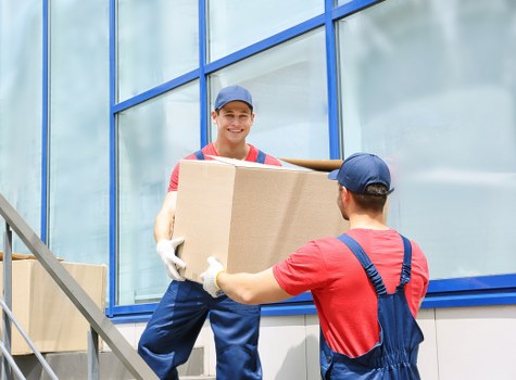 Safety-focused staff member walking through storage aisles