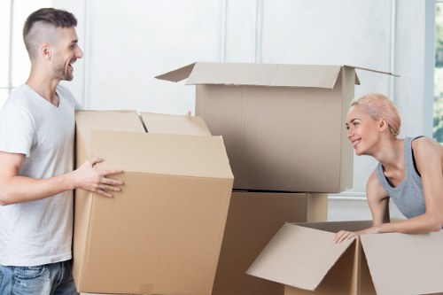 Packed boxes prepared for house removals in Tokyngton